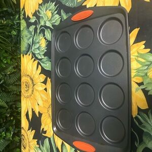 Nonstick 12-Cup Muffin Pan with Orange Grip Handles